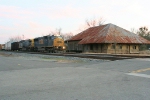 CSX 8779 with Q680 by the depot